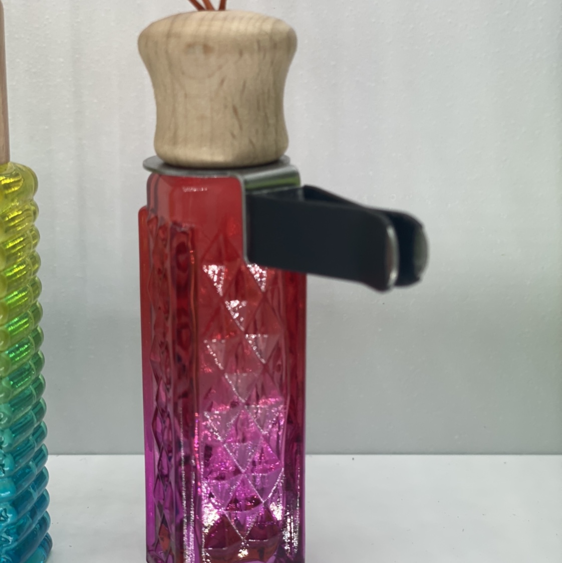 A colorful bottle of car perfume undefined