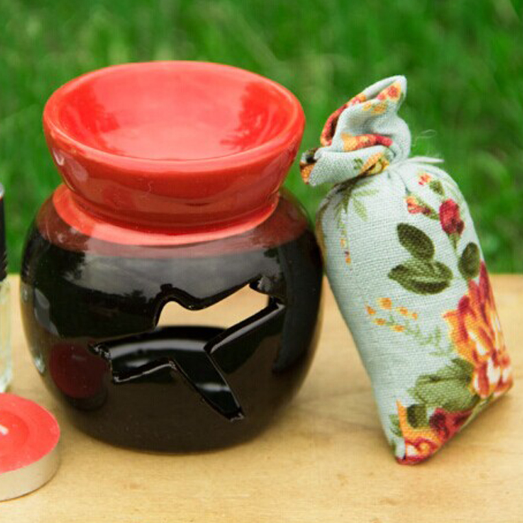 Ceramic aromatherapy furnace wholesale creative dried flower aromatherapy furnace hand hollowed-out perfume pouch home aromatherapy decorations full figure